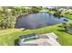 Home with a private pool and lush green backyard at 252 Medalist Rd, Rotonda West, FL 33947