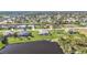 Wide aerial showcasing the house's location in a residential area at 252 Medalist Rd, Rotonda West, FL 33947