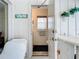 Guest bathroom with single sink and toilet at 252 Medalist Rd, Rotonda West, FL 33947