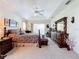 Bright bedroom with wooden furniture and carpet flooring at 252 Medalist Rd, Rotonda West, FL 33947