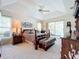 Main bedroom with sliding doors to lanai and pool view at 252 Medalist Rd, Rotonda West, FL 33947