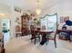 Bright dining room with wood table and chairs at 252 Medalist Rd, Rotonda West, FL 33947