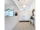Bright and airy foyer with tile floors and double doors at 252 Medalist Rd, Rotonda West, FL 33947