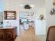 View of kitchen from dining area, island, and appliances at 252 Medalist Rd, Rotonda West, FL 33947