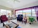 Relaxing living room with water views and ample seating at 252 Medalist Rd, Rotonda West, FL 33947