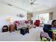Living room with comfortable seating and access to other rooms at 252 Medalist Rd, Rotonda West, FL 33947