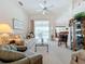 Spacious living room with ample natural light and comfy seating at 252 Medalist Rd, Rotonda West, FL 33947