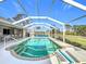 Inviting screened pool area with ample deck space for lounging at 252 Medalist Rd, Rotonda West, FL 33947