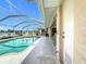Spacious pool and lanai with water views at 252 Medalist Rd, Rotonda West, FL 33947
