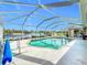 Large screened pool with great backyard views at 252 Medalist Rd, Rotonda West, FL 33947