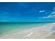 Scenic beachfront view with clear water at 26906 Weiskopf Dr, Englewood, FL 34223