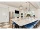 Modern community kitchen with stainless steel appliances and granite countertops at 26906 Weiskopf Dr, Englewood, FL 34223