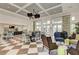 Community room with a kitchen, dining area, and comfortable seating at 26906 Weiskopf Dr, Englewood, FL 34223