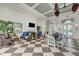 Community room features comfortable seating, a fireplace, and a dining area at 26906 Weiskopf Dr, Englewood, FL 34223