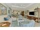 Spacious living room features an open floor plan and ample natural light at 26906 Weiskopf Dr, Englewood, FL 34223