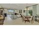 Relaxing living room with sectional sofa and access to backyard at 26906 Weiskopf Dr, Englewood, FL 34223