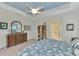 Spacious main bedroom with a tranquil atmosphere and plenty of light at 26906 Weiskopf Dr, Englewood, FL 34223