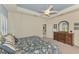 Main bedroom features a relaxing atmosphere and ensuite bath at 26906 Weiskopf Dr, Englewood, FL 34223
