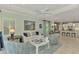 Open floor plan with living room, kitchen and dining area at 26906 Weiskopf Dr, Englewood, FL 34223