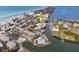An aerial view showcasing the property's waterfront location and surrounding neighborhood at 2805 N Beach Rd # B, Englewood, FL 34223