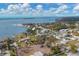 Wide aerial view of the neighborhood and waterfront at 321 S Mango St, Englewood, FL 34223