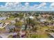 Aerial view of neighborhood, showing a house and surrounding area at 321 S Mango St, Englewood, FL 34223