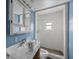 Bathroom needs complete renovation, blue walls at 321 S Mango St, Englewood, FL 34223