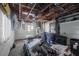 Interior view of a cluttered garage with a water heater at 321 S Mango St, Englewood, FL 34223