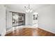 Dining room with wood flooring and sliding doors to the pool area at 4204 Cockrell St, Port Charlotte, FL 33948