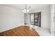 Bright dining area with wood floors and access to the pool at 4204 Cockrell St, Port Charlotte, FL 33948