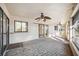 Screened lanai with brick-patterned flooring and pool access at 4204 Cockrell St, Port Charlotte, FL 33948