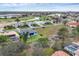 Wide aerial view showing the house's location in a golf course community at 4220 Cape Haze Dr, Placida, FL 33946