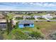 Aerial view of the house, showcasing its backyard and surroundings at 4220 Cape Haze Dr, Placida, FL 33946