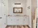 Bathroom with white cabinets and granite countertop at 4220 Cape Haze Dr, Placida, FL 33946