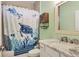 Bathroom with bathtub, white vanity, and marble countertop at 4220 Cape Haze Dr, Placida, FL 33946
