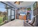 Relaxing enclosed patio with comfortable seating and entertainment system at 4220 Cape Haze Dr, Placida, FL 33946