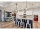 Open concept kitchen features an island with seating and stainless steel appliances at 4220 Cape Haze Dr, Placida, FL 33946