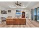 Open living room with access to the kitchen and main bedroom at 4220 Cape Haze Dr, Placida, FL 33946