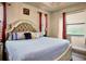 Large main bedroom with king-size bed and plenty of natural light at 4220 Cape Haze Dr, Placida, FL 33946