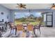 Covered patio with outdoor dining set and view of backyard at 4220 Cape Haze Dr, Placida, FL 33946