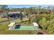 Aerial view of community with shuffleboard and tennis courts at 4260 Placida Rd # 18C, Englewood, FL 34224