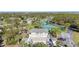 Aerial view of community pool and tennis courts at 4260 Placida Rd # 18C, Englewood, FL 34224