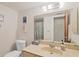 Bathroom features vanity, toilet, and shower/tub combo at 4260 Placida Rd # 18C, Englewood, FL 34224