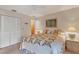 Bedroom with queen bed and built-in closet at 4260 Placida Rd # 18C, Englewood, FL 34224
