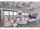 Community room with seating, tables, and a pool table at 4260 Placida Rd # 18C, Englewood, FL 34224
