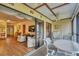 Enclosed patio with seating and view of living room at 4260 Placida Rd # 18C, Englewood, FL 34224