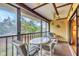 Enclosed patio with outdoor seating at 4260 Placida Rd # 18C, Englewood, FL 34224