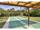 Two shuffleboard courts under covered areas at 4260 Placida Rd # 18C, Englewood, FL 34224