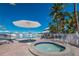 Relaxing hot tub near the pool area at 5000 Gasparilla Rd # 26A, Boca Grande, FL 33921