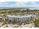 Aerial view of condo building near the water at 5000 Gasparilla Rd # Dc307, Boca Grande, FL 33921